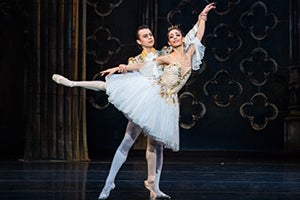 Cinderella and the Prince dance together at the ball.